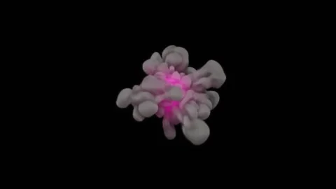 A patch of gray smoke with a pink shimmering core grows on a black background. Stock Footage 177226070