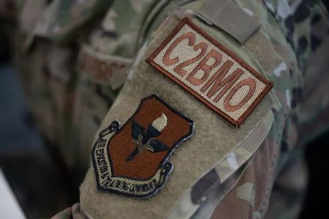 A patch identifying the command and control battle management operations c... Stock Photos