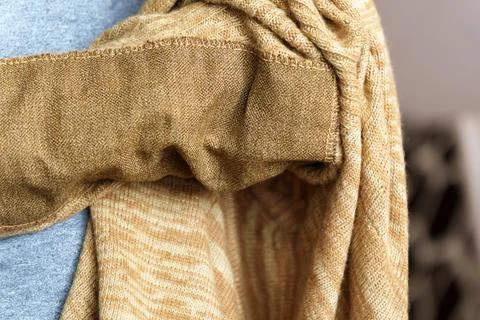 Patch on a man wool sweater. Mending clothes we sew, wear, repair. Selectiv.. Stock Photos