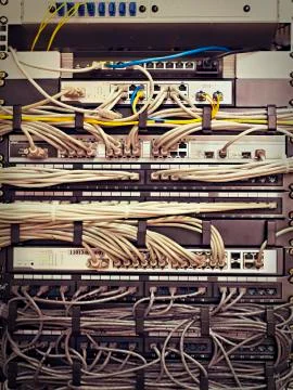 Patch Panel server rack with cords in different colors Stock Photos