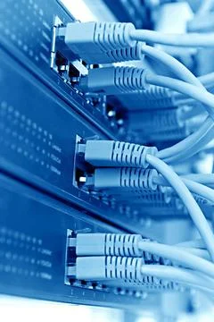 Patch Panel server rack with cords in the background Patch Panel server ra... Fotos de archivo