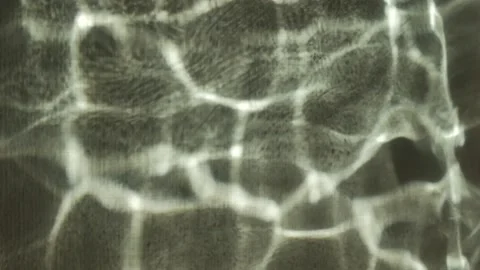 Patch of reflected lights, moves on a white wall. Stock Footage 150053671