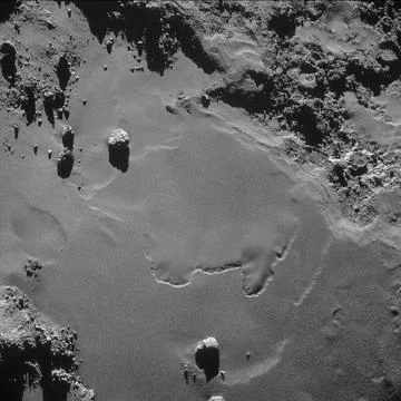 A patch of relatively smooth ground on the nucleus surface of comet 67P/Ch... Fotos de archivo