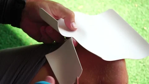 Patch repair kit with glue for inflatable boats, SUP, raft. Man repair Stock Footage 260531495