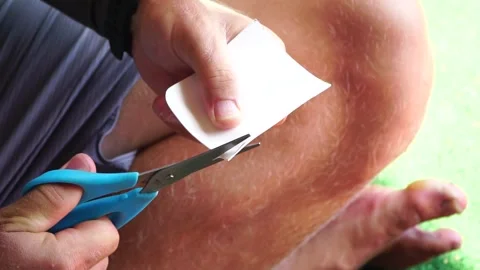 Patch repair kit with glue for inflatable boats, SUP, raft. Man repair Stock Footage 264945022