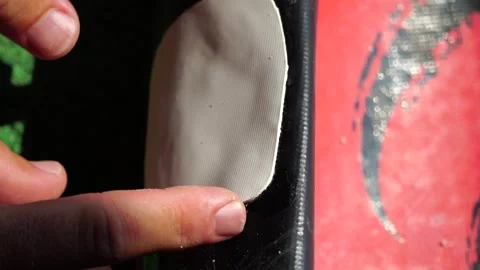Patch repair kit with glue for inflatable boats, SUP, raft. Man repair Stock Footage 271177473