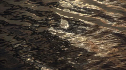 The patch of sunlight on the surface of the water. Slow motion. Video stock 53361674