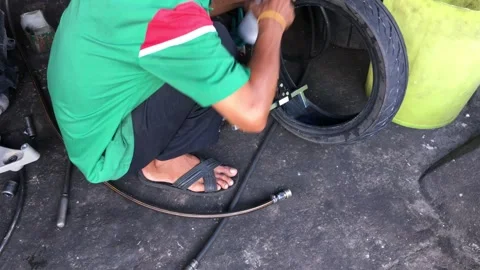 Patch up tires Stock Footage 244657212