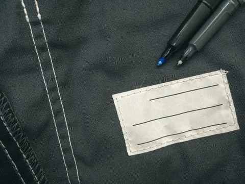 Patch on work clothes to write the name of the owner. Close-up of a clean name Foto stock