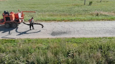 Patching of the road special equipment Stock Footage 129771231