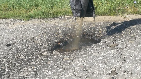 Patching of the road special equipment Stock Footage 129771345