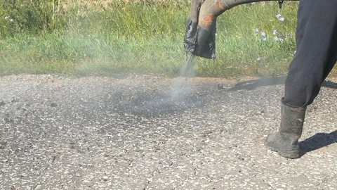 Patching of the road special equipment Stock Footage 129771435