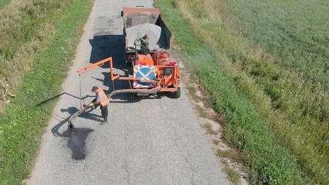 Patching of the road special equipment Stock Footage 129771760