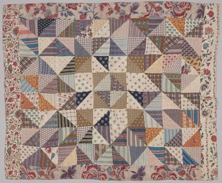 Patchwork of adjacent triangles of colorful cotton, surround with eighteen... 写真素材