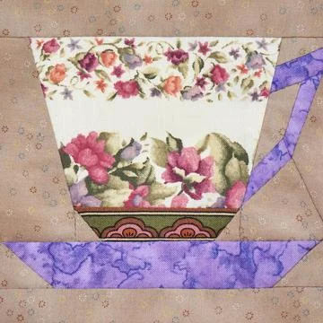 Patchwork block of the cup with a pattern of flowers Stock-Fotos
