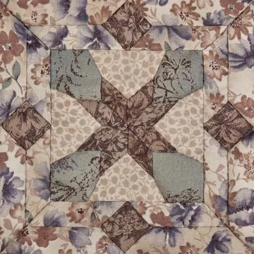 Patchwork block from pieces of fabrics, detail of quilt Stock Photos