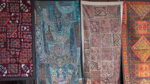 Patchwork carpet in local market, India. Close up Stock Footage 109527146