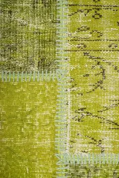 Patchwork carpet on white background Stock Photos