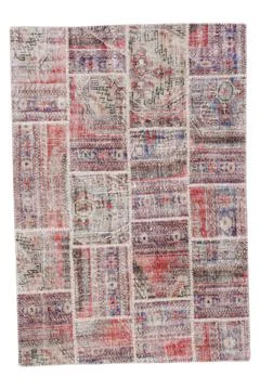 Patchwork carpet on white background Stock Photos