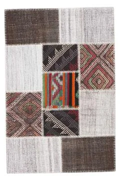Patchwork carpet on white background Stock-Fotos