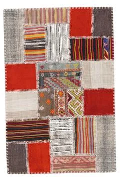 Patchwork carpet on white background Stock Photos