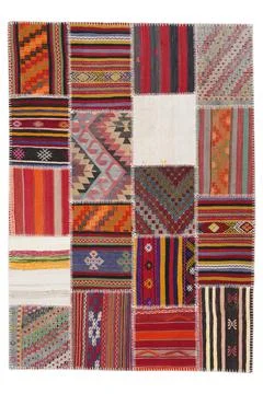 Patchwork carpet on white background Stock-Fotos