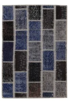 Patchwork carpet on white background Stock Photos