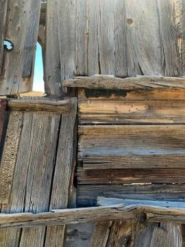 Patchwork of Deteriorating Wood Panels Background Stock Photos