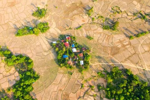 Patchwork of dry fields around rural village Stockfoto's