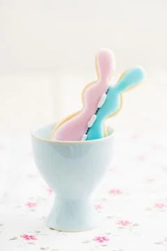 Patchwork Easter bunny sugar cookie in egg cup Stock Photos