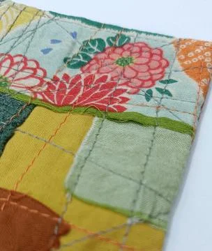Patchwork fabric coaster abstract textile design Stock Photos