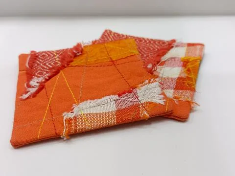 Patchwork fabric coasters handmade set Stock Photos