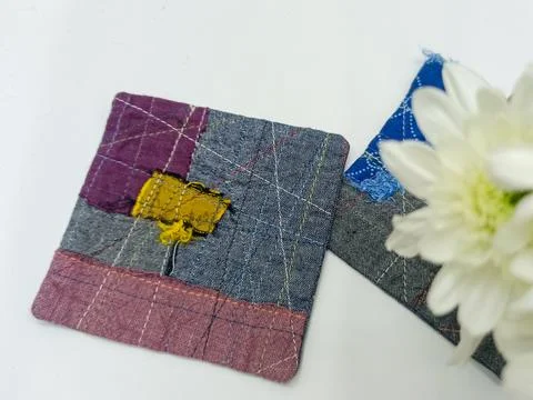 Patchwork fabric detail abstract textile design.  库存照片