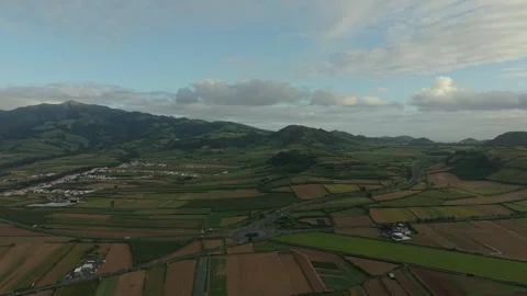 Patchwork Farm Fields and Mountains on Sao Miguel From Drone Stock Footage 346480802