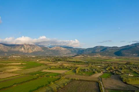 Patchwork farmland and distant Greek mountains 库存照片