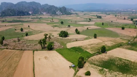 Patchwork farmland and open countryside near Thalang Laos Stock Footage 327292522