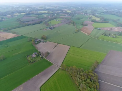 Patchwork farmland landscape from the air (unedited) Stock Footage 75724461