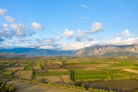 Patchwork fields and distant Greek mountains Fotos de archivo
