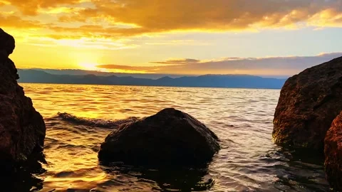 Patchwork Fields and Farmhouses Surrounded by Hills Video stock 304314578