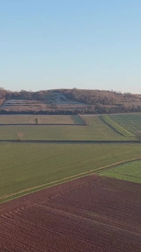 The patchwork fields and rolling hills of the Nievre countryside in France Stock Footage 346635916
