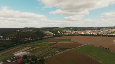 Patchwork Fields Below a High Flying Drone Stock Footage 347196221
