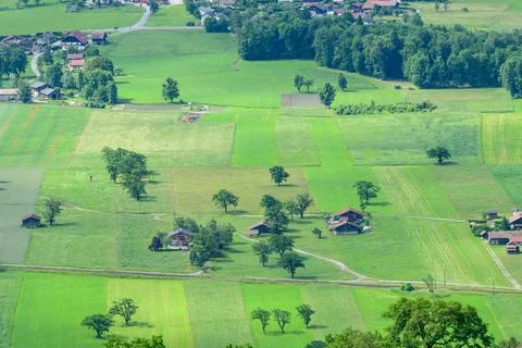 Patchwork fields with scattered rural houses, Passy Fotos de archivo