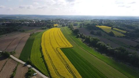 Patchwork Fields at Sunrise – Aerial View of the Countryside, Poland Stock Photos