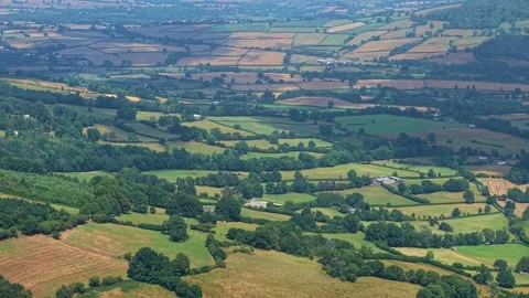 Patchwork Fields of the Welsh Countryside from Above Stock Footage 322741097