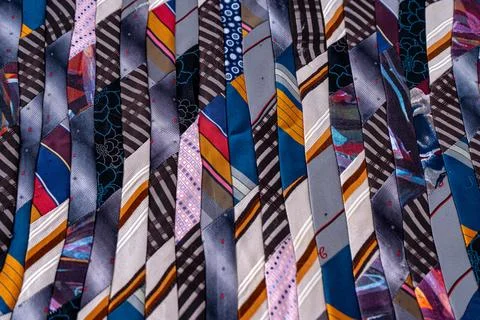 Patchwork. A fragment of multi-colored pieces of fabric sewn together. Stock Photos