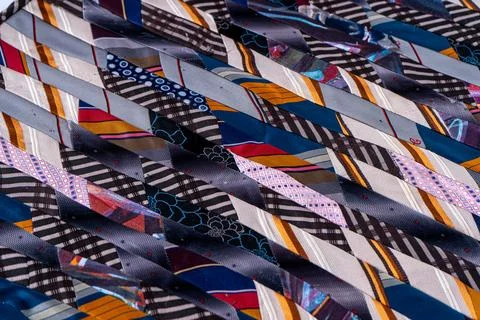 Patchwork. A fragment of multi-colored pieces of fabric sewn together. Colorful Foto stock