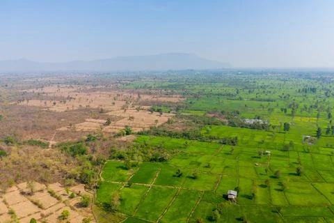 Patchwork of green and dry fields, Laos 스톡 사진