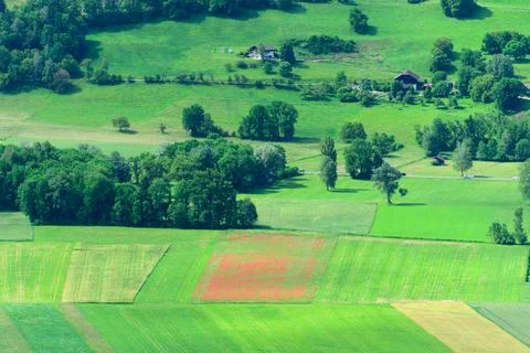 Patchwork of green fields near Passy countryside Stockfoto's