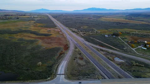 Patchwork of green leading toward mountains Stock-Footage 166981920