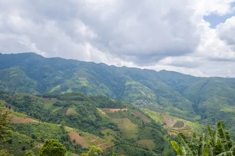 Patchwork hills and cloudy sky, northern Vietnam Foto stock